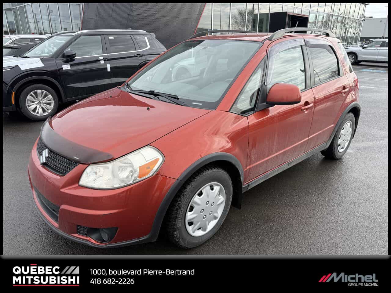 2011 Suzuki SX4 JX Awd, Régulateur de vitesse, Démarreur à distance, Lecteur MP3 - Image 1